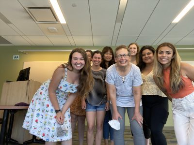 CLL members in a group photo, unmasked and smiling.